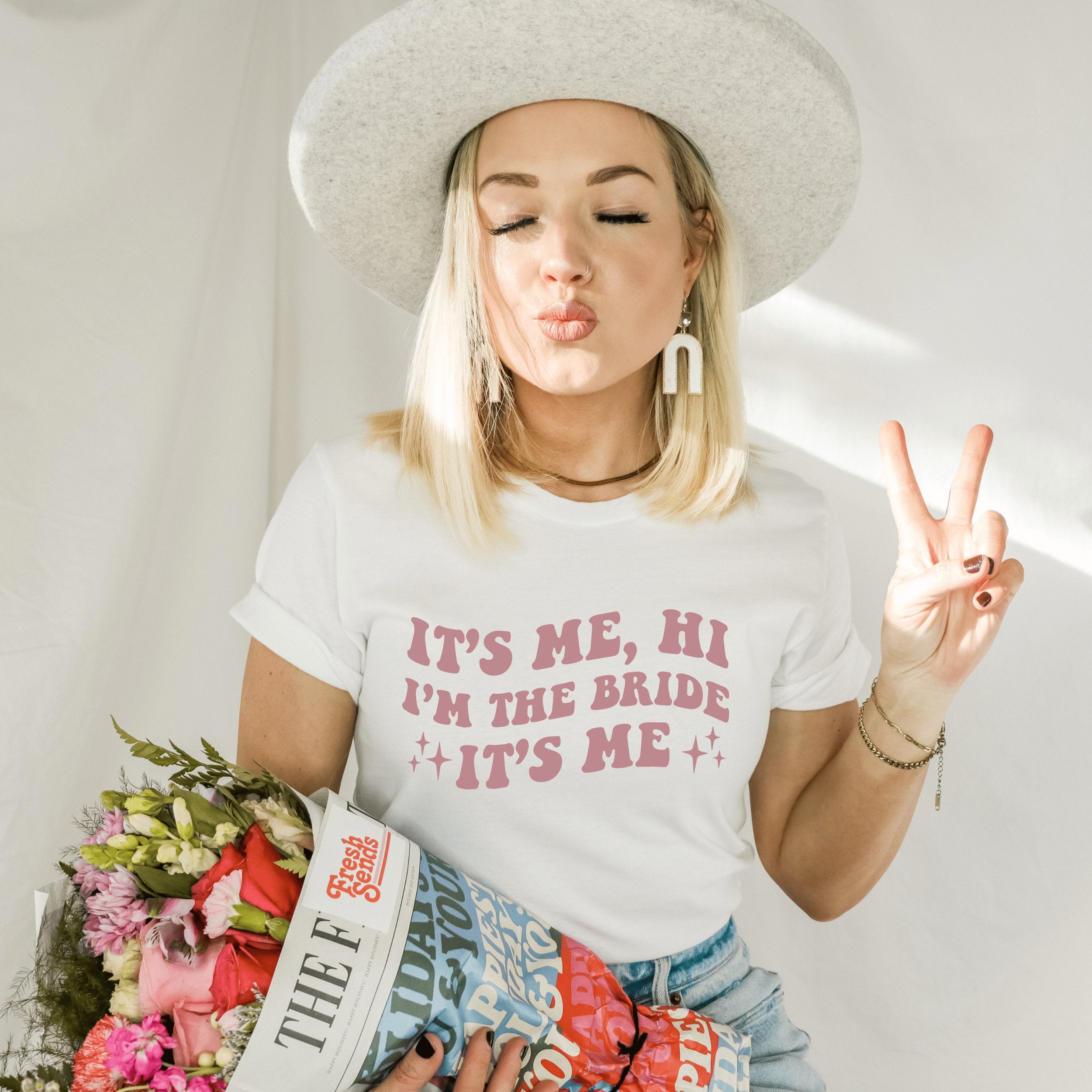 Bride-to-be wearing a white shirt that says